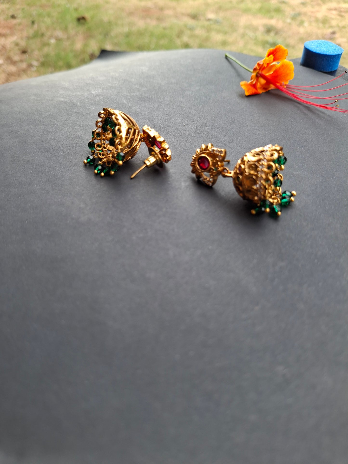Traditional Gold-Plated Jhumka Earrings with Colorful Stones