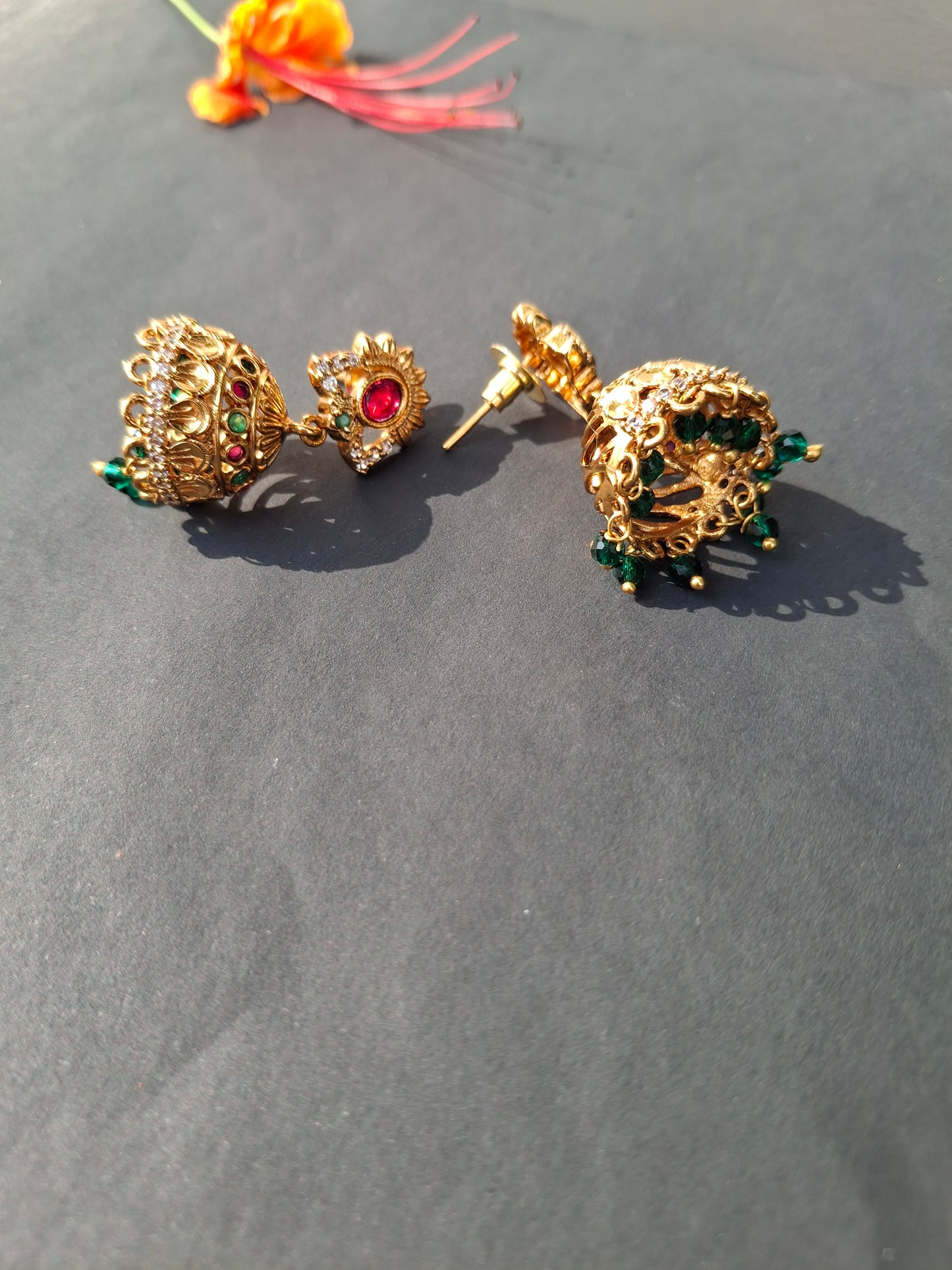 Traditional Gold-Plated Jhumka Earrings with Colorful Stones