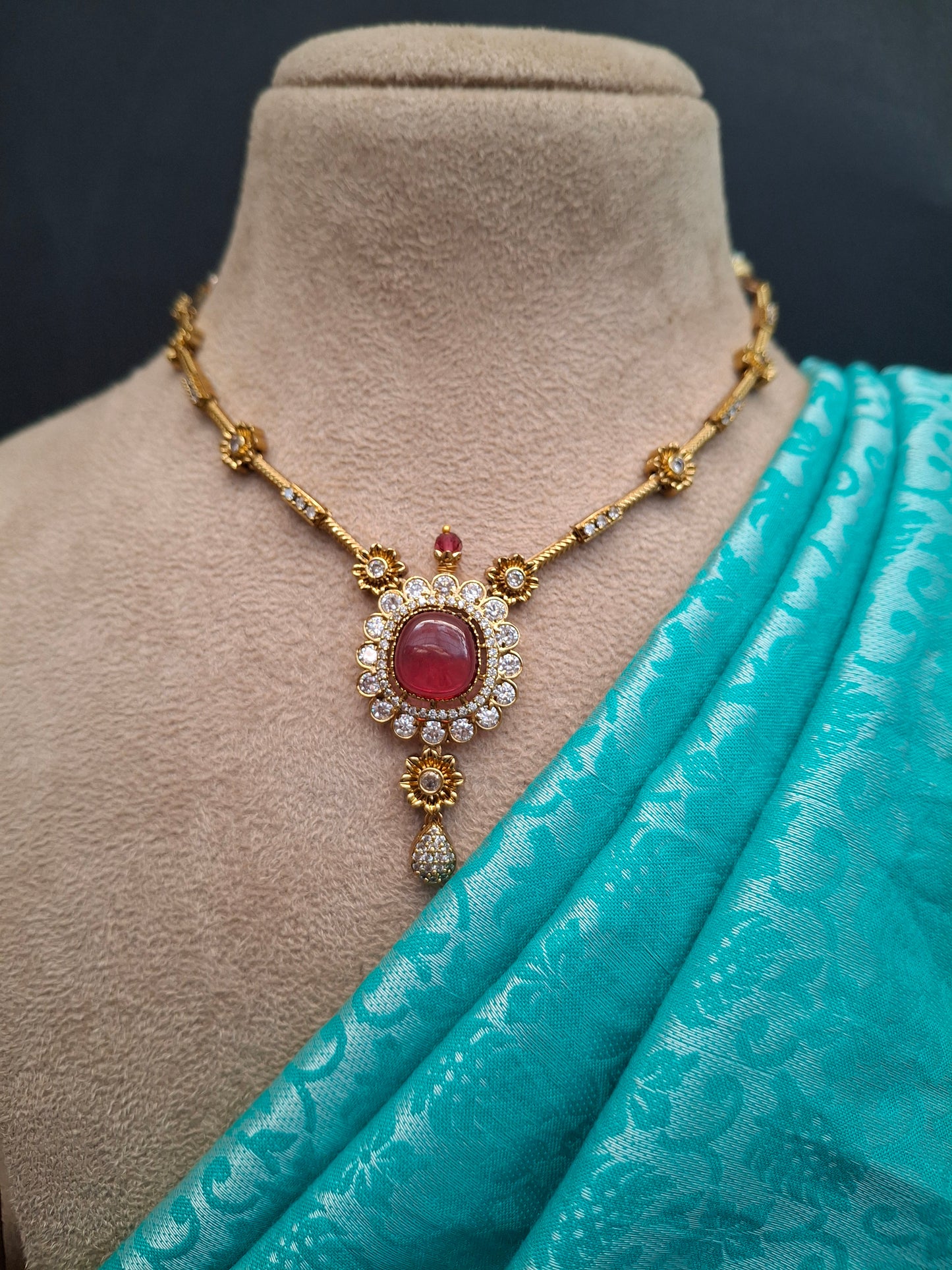 Elegant Pink Kundan Circular Pendant Set with Earrings