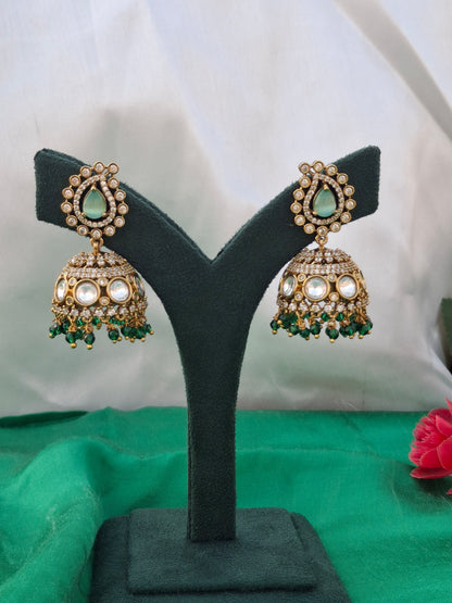 Gold-Plated Jhumka Earrings with Pastel Green, White, and Dark Green Stones