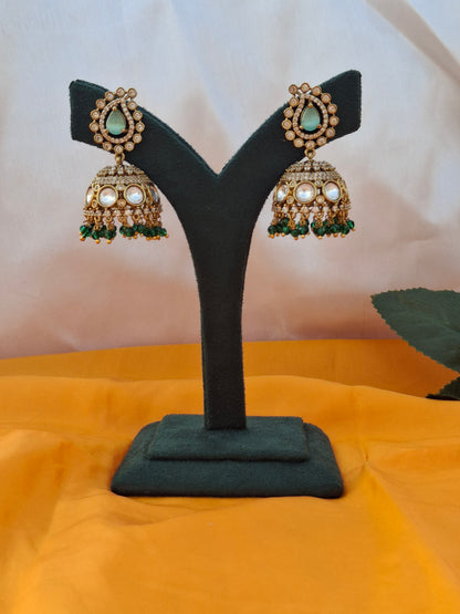 Gold-Plated Jhumka Earrings with Pastel Green, White, and Dark Green Stones