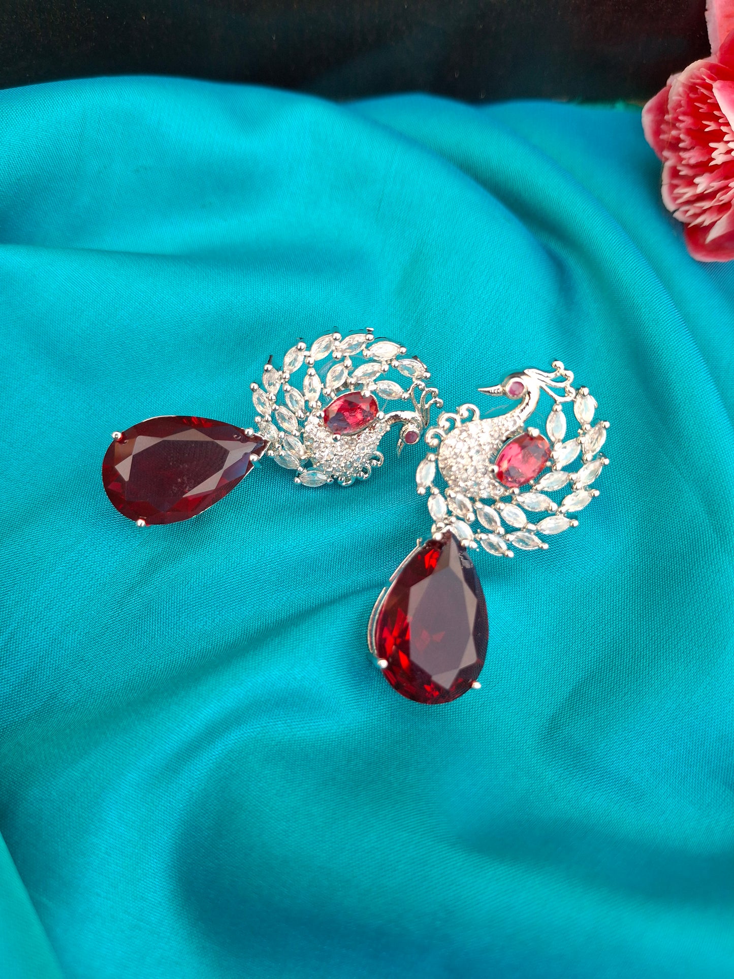 Regal Silver Peacock Earrings with Ruby Red Teardrops