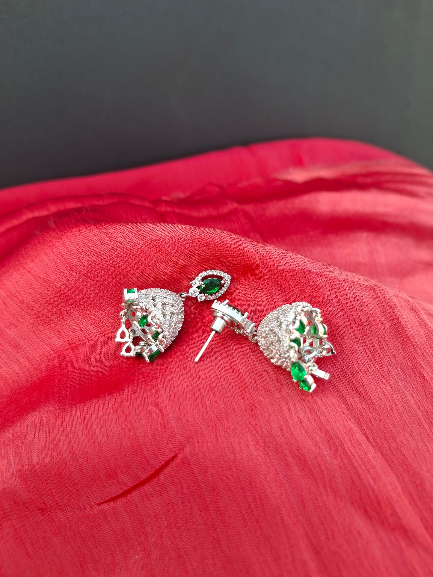 Silver-Plated Crystal Jhumkas with Emerald Green Drops