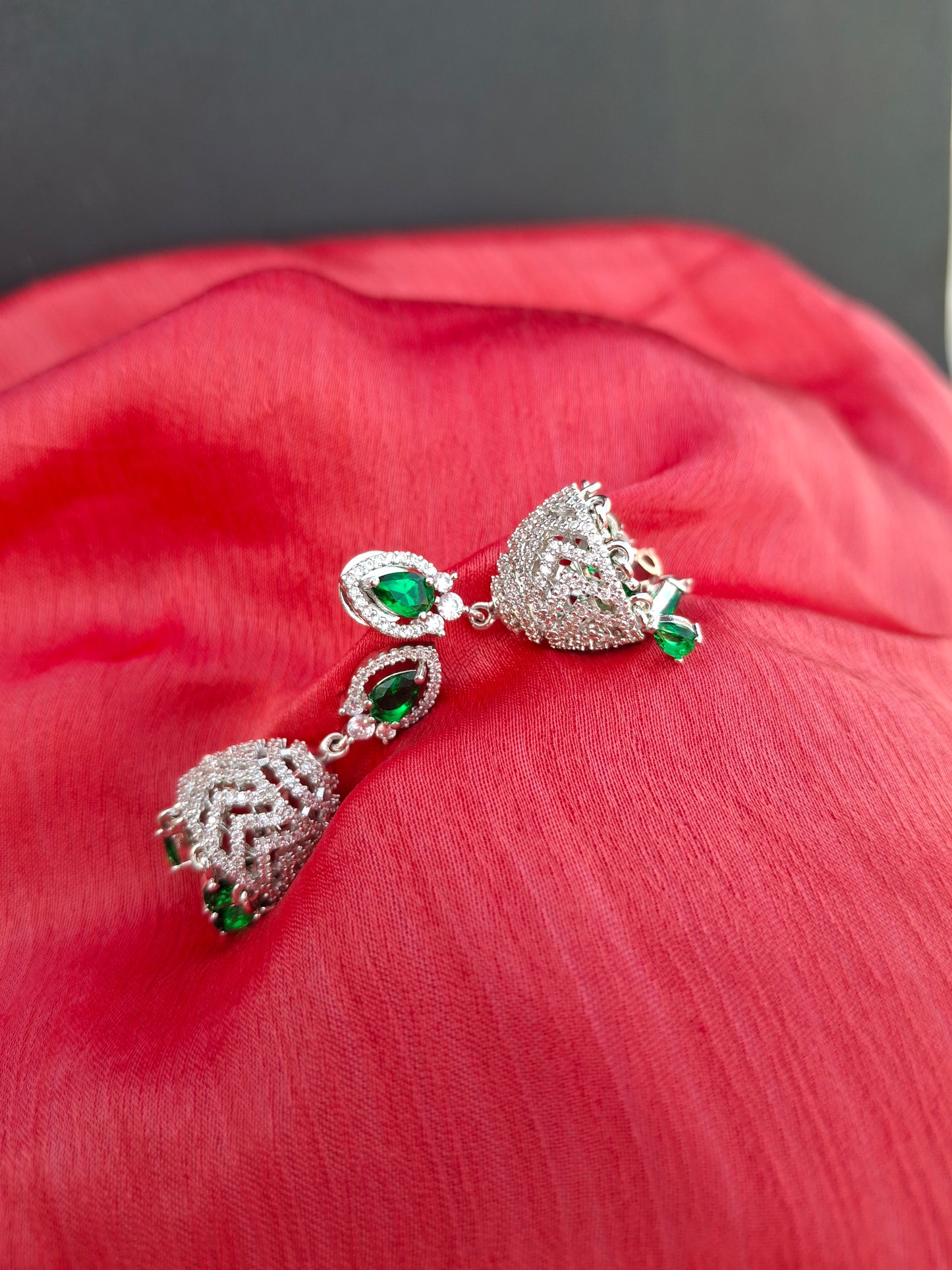 Silver-Plated Crystal Jhumkas with Emerald Green Drops