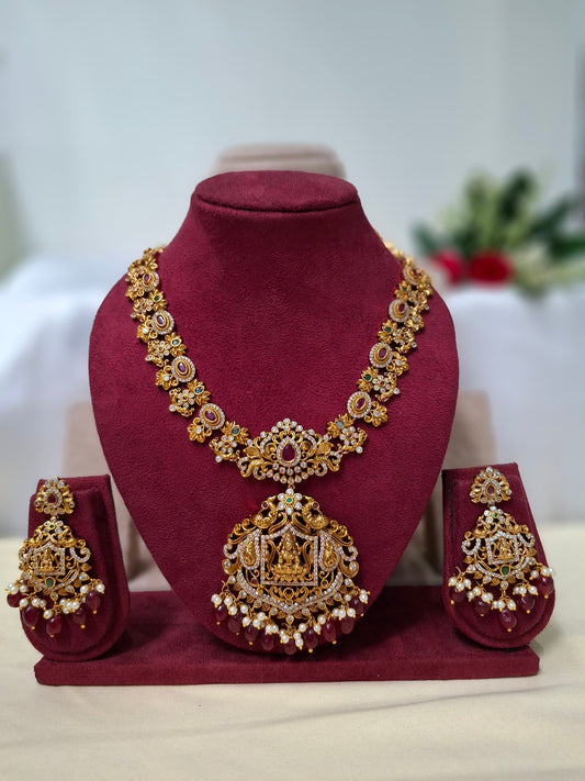 Divine Maa Lakshmi Pearl & Maroon Bead Pendant Set with Lotus-Inspired Chain & Earrings