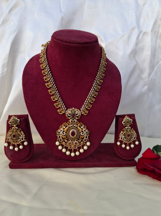 Majestic Peacock & Floral Pendant Set with Pearls, Pink Kundans & AD Accents
