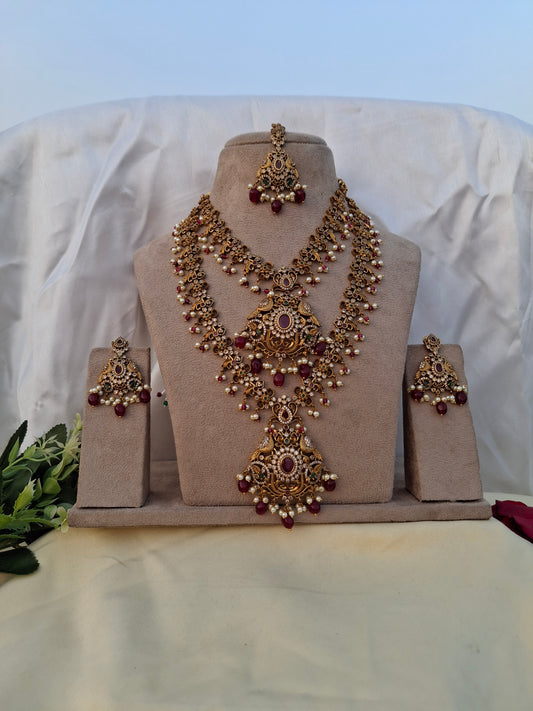Graceful Peacock Pendant Set with Pink Oval Kundans, Pearls & Maang Tikka