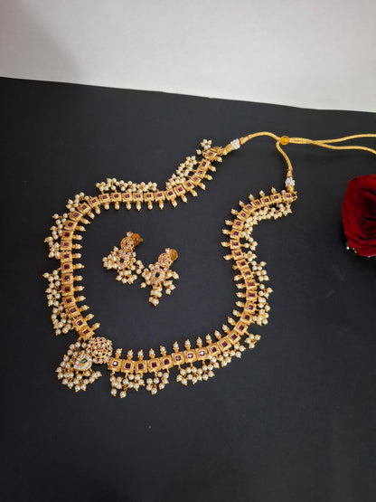 Delicate Pendant Set with Green & Pink Kundans, Pearl Chain & Earrings